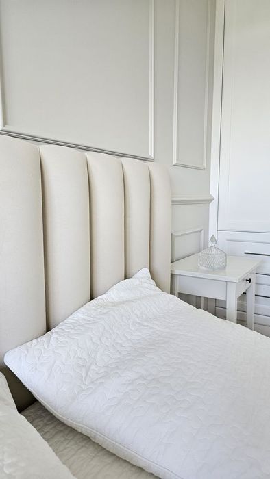 Łóżko tapicerowane półwałki panele welur pojemnik stelaż na wymiar 220