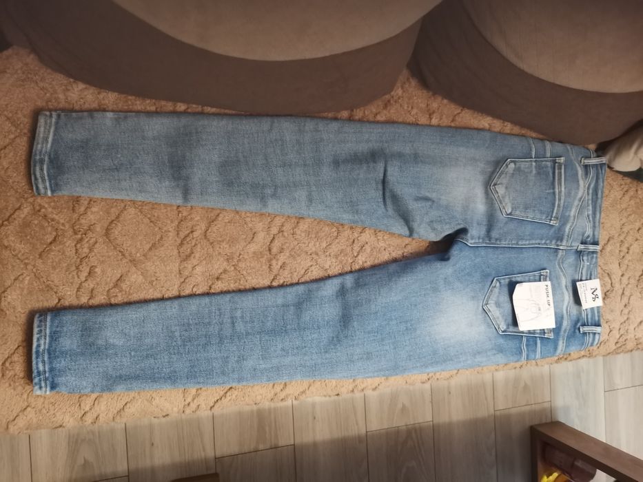 Nowe spodnie niebieskie M Sara 31 push up cekiny motyle