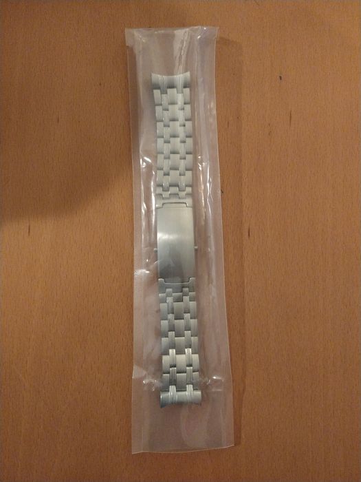 Bracelete de relógio inoxidável.