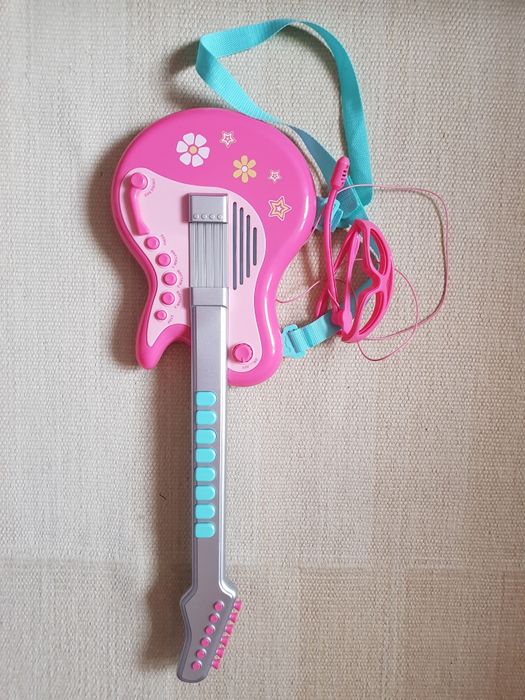 MotherCare grająca gitara