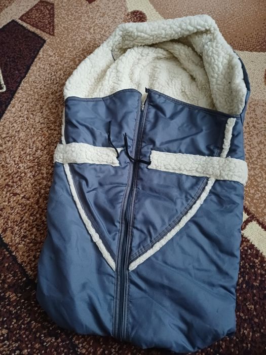 Продам теплий чохол на овчині в санчата або коляску.