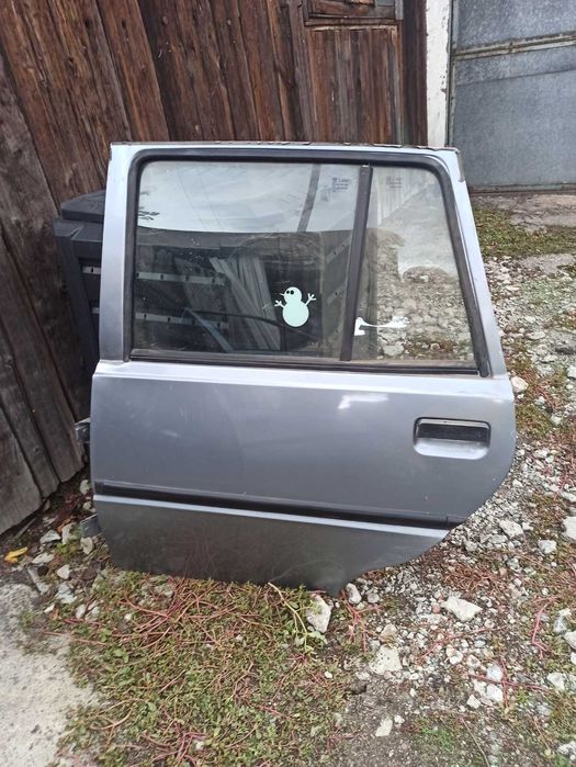 Продам двери Славута люкс с водительской сторони