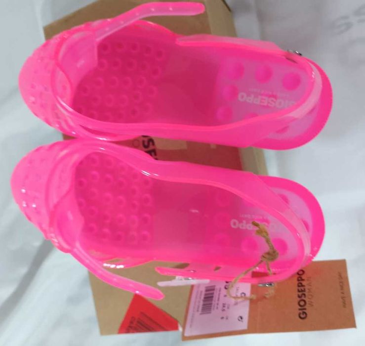 Chinelos tipo caranguejo fúcsia transparente