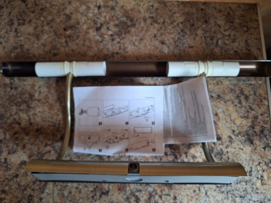 Lampa galeryjka w kolorze stare złoto