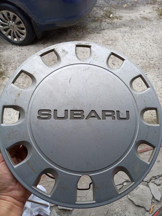 Продам оригинальные колпаки Субару R13