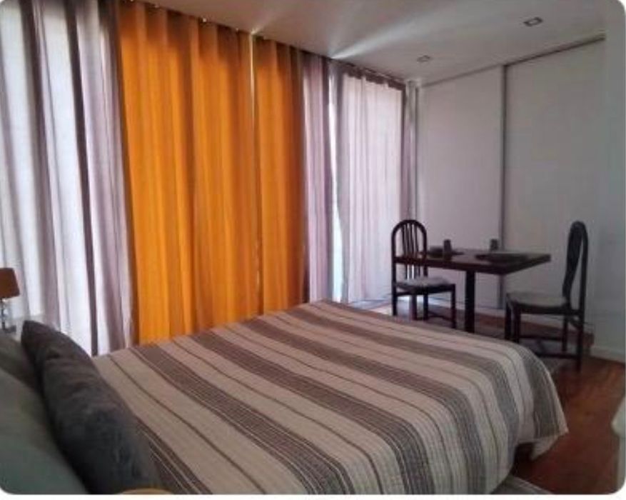 Quartos com partilha  de cozinha e WC