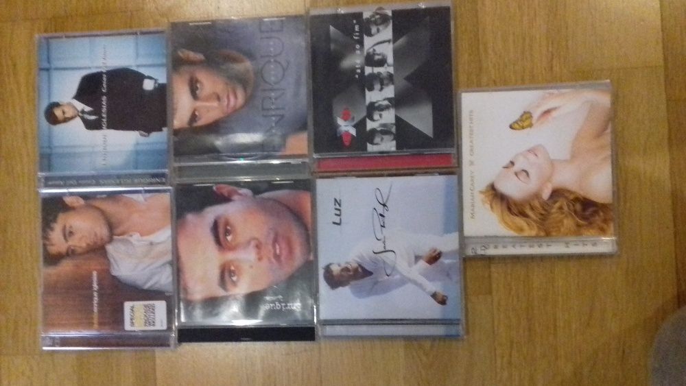 Enrique Iglesias and Mariah Carey CDs