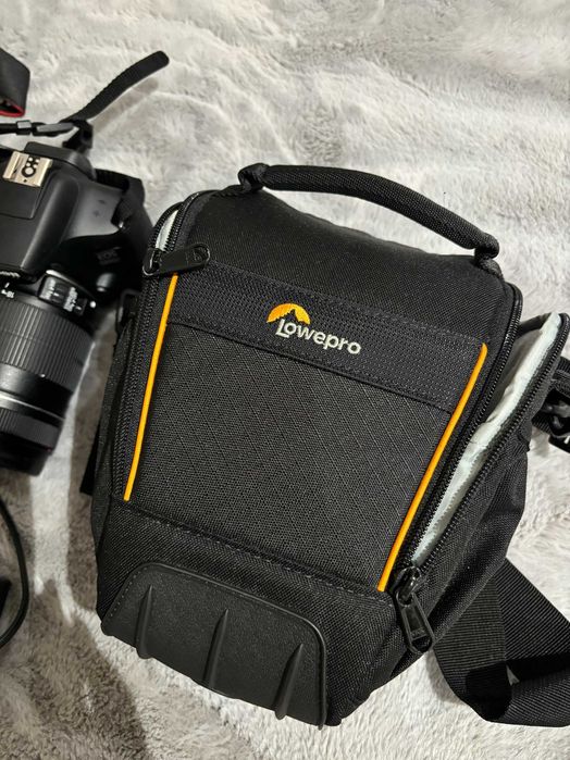 Canon 1300 D + lente 18-135mm + bolsa de oferta