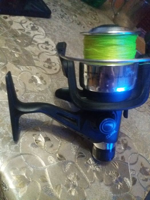 Kołowrotek Strike i wędkę Robinson