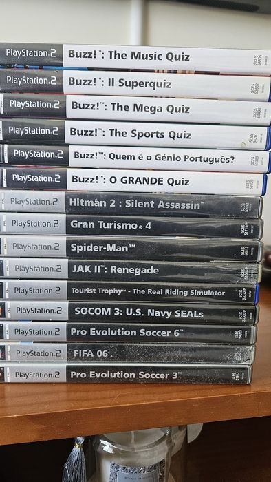 PS2 Slim com  52 jogos e comandos Buzz