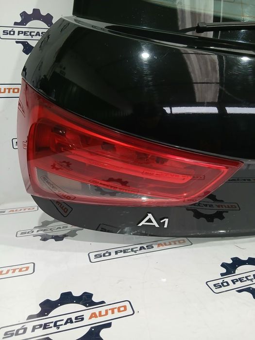 FAROLIM ESQUERDO PRETO AUDI A1 1.2TFSI ANO: 2012