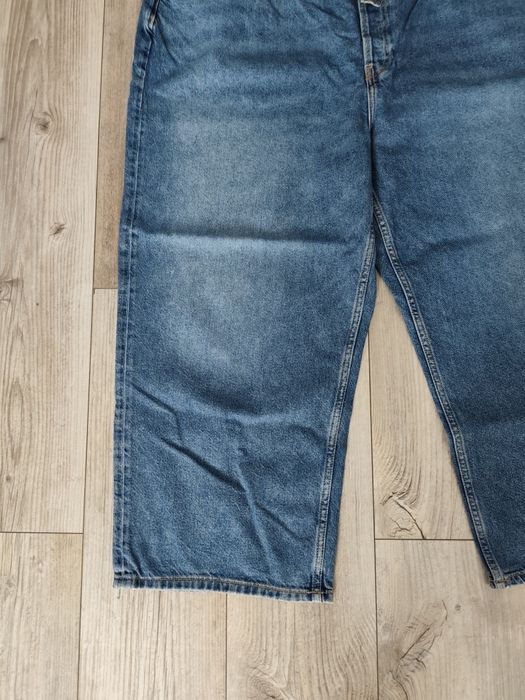 Spodnie jeansowe damskie z paseczkiem r. 52
