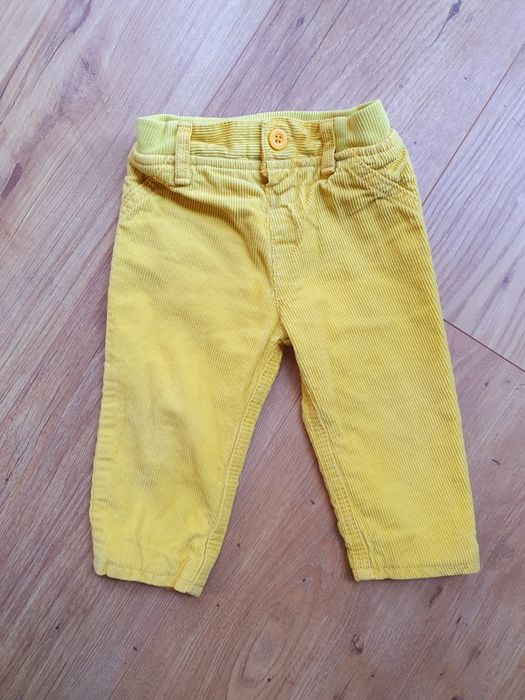 Spodnie sztruksy żółte M&C rozm 6/9mc