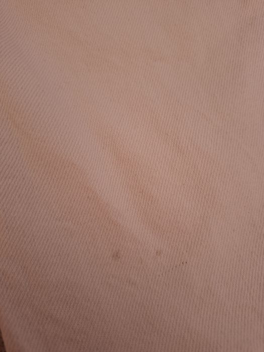 Dżinsy białe z rozcięciami