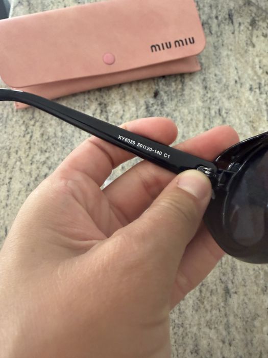 Okulary przeciwsloneczne Miu Miu czarne nowe z pudelkiem
