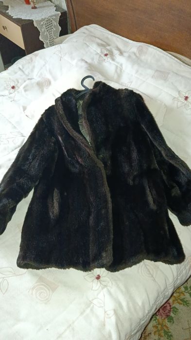 Casacos e calçado de mulher