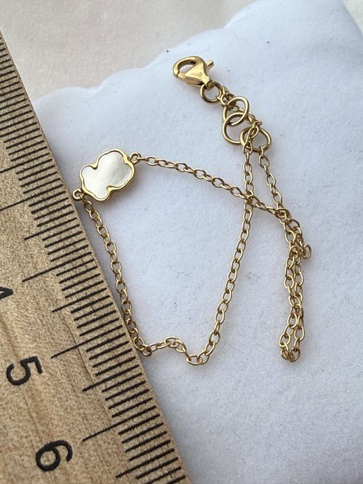 Золотой браслет тоиs