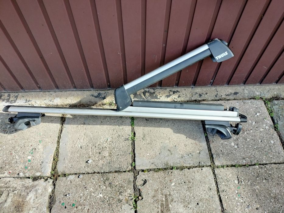 Bagażnik dachowy Thule , belki , 4 stopy, na relingi,  baza  + uchwyt