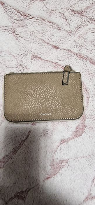 Mochila + porta moedas