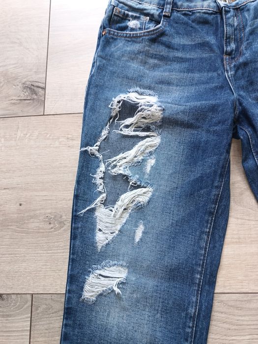 Spodnie jeansy z rozdarciami  Zara TRF r 36