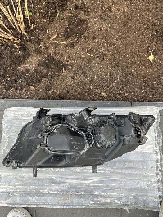 Reflektory BMW E90 E91 L+P ORYGINAŁ ZKW komplet przód