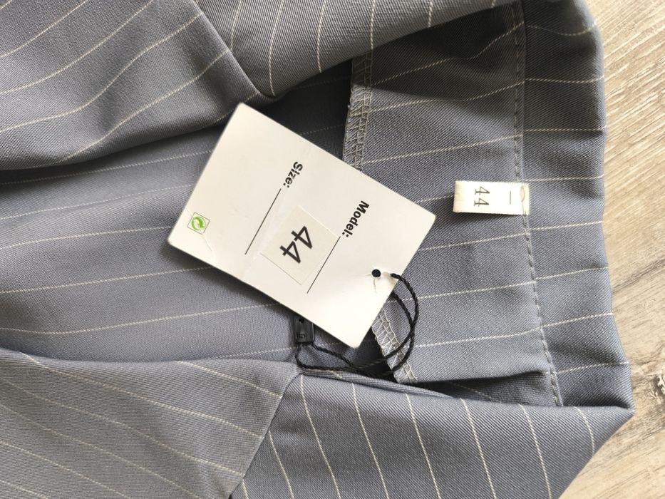 Брюки нові сірі в смужку