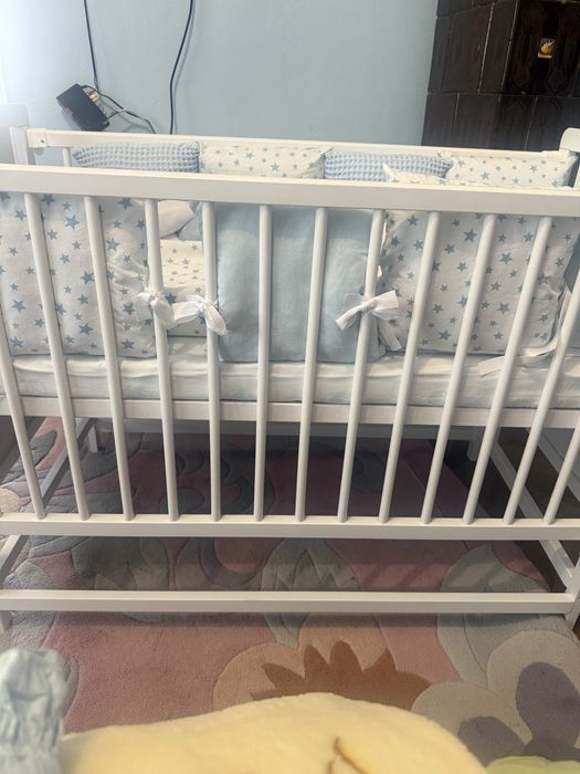 Дитяче ліжечко-колиска