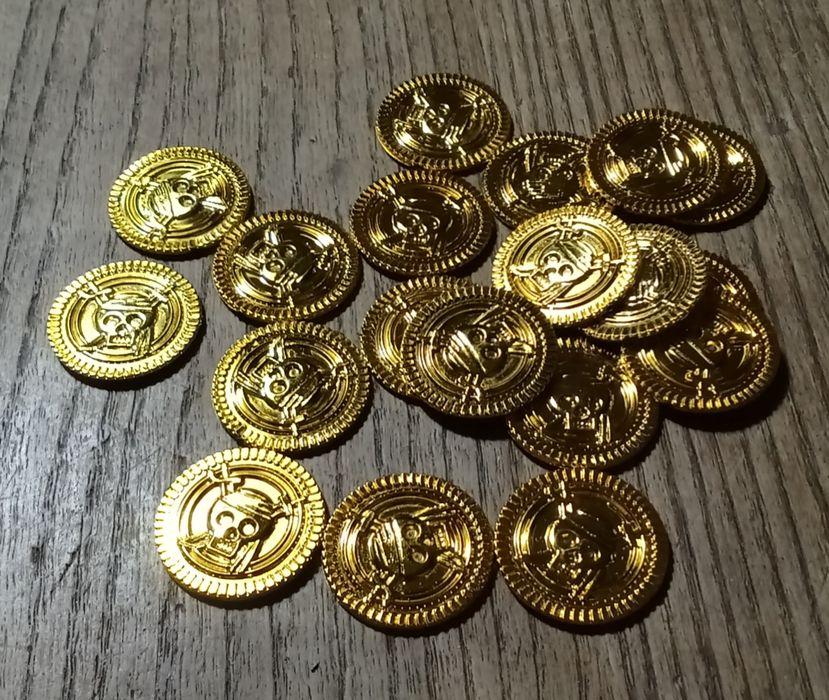 Moedas piratas de plástico
