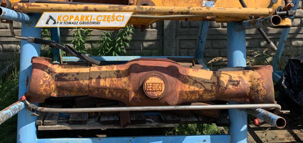 Belka mostu przedniego z napędem CASE 580 G