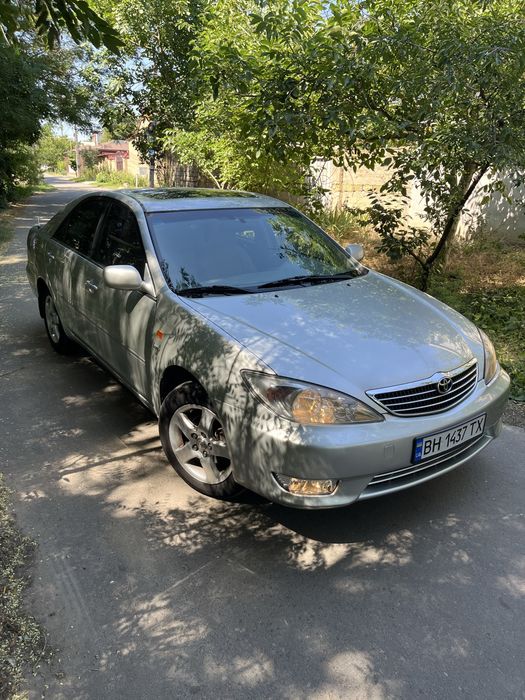 Камри 30, 2.4 газ/бензин на автомате.