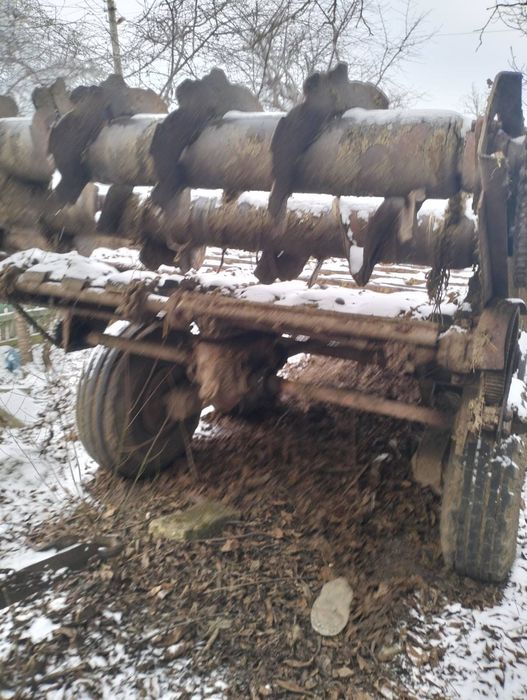 Розкидач гною в робочому стані