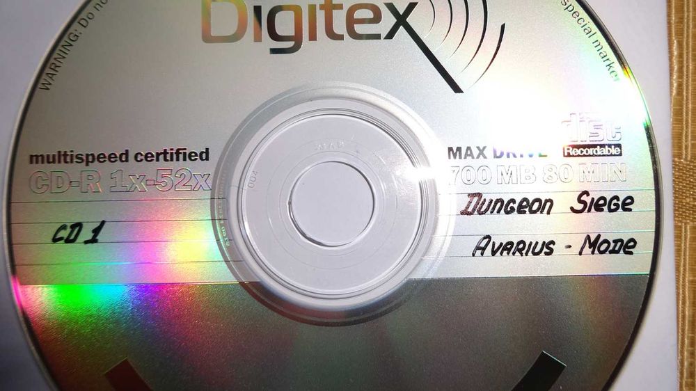 Игра Dungeon Siege для компьютера на  двух CD-дисках