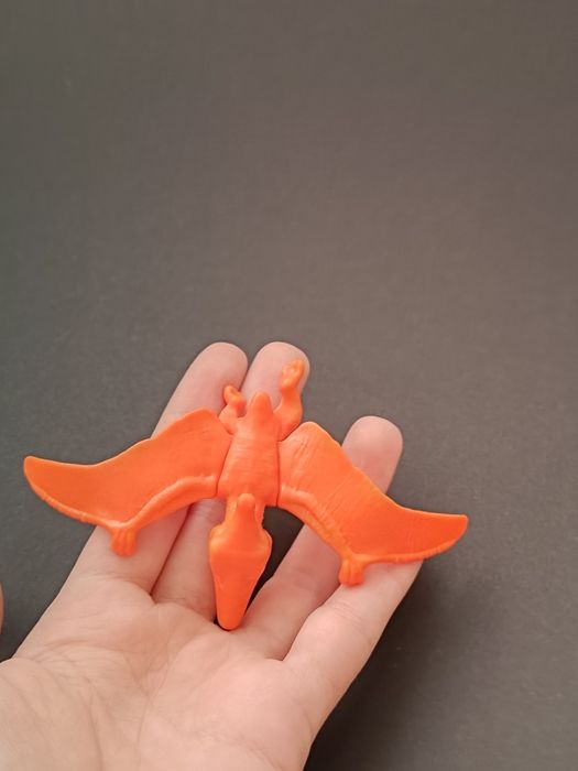 Figurka dinozaura z Kinder joy