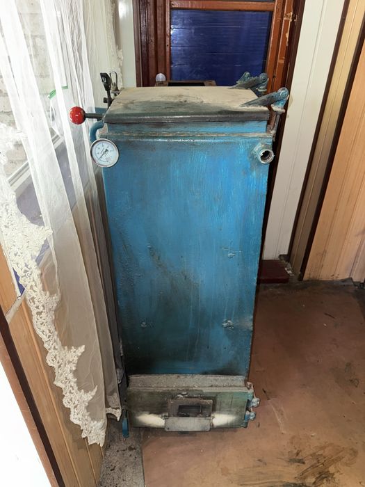 Твердотопливный котел верхней загрузки