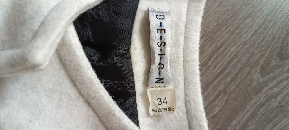 Kremowy płaszcz rozmiar 34