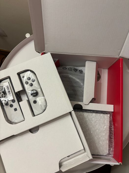 Nintendo Switch Oled + jogo Mario + película + estojo de transporte