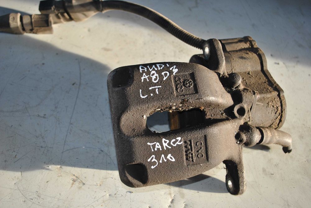Zacisk lewy Audi A8 d3