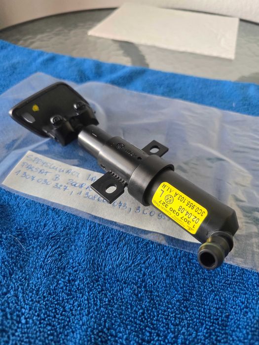 Spryskiwacz lampy przedniej lewej VW PASSAT B6 2008