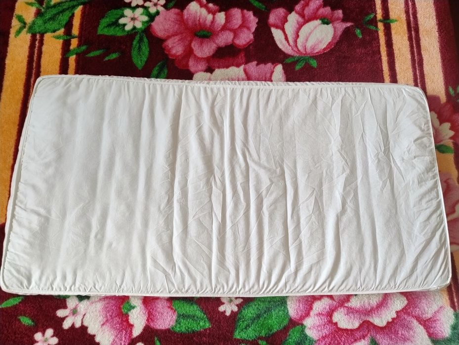 Дитяче ліжечко-маятник