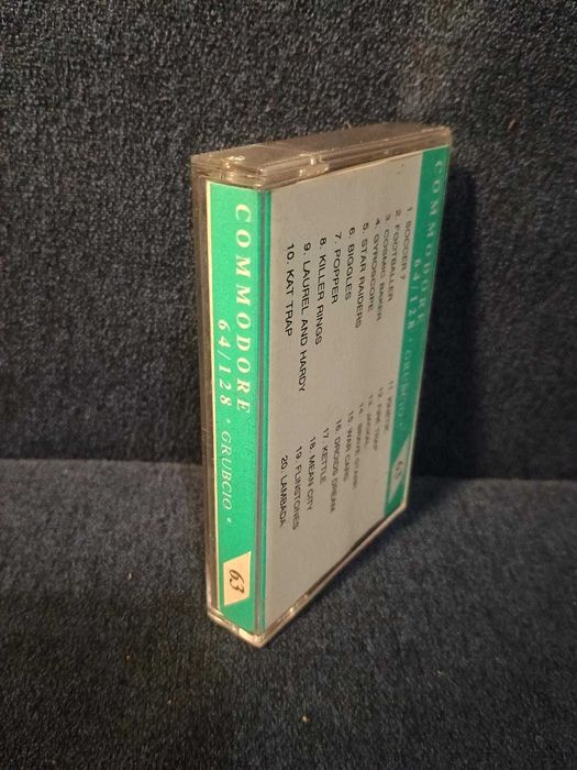 Kaseta Commodore 64 GRUBCIO 63 - składanka gier