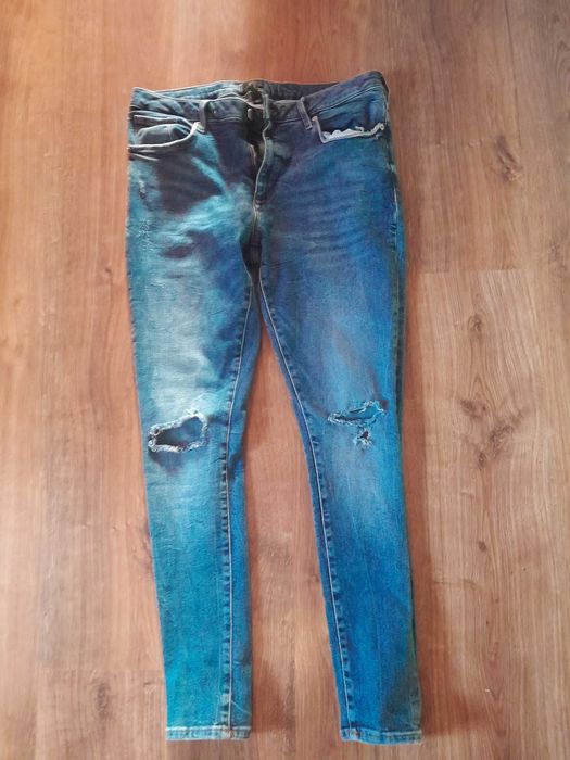 Jeansy męskie slim River island z dziurami 36/32