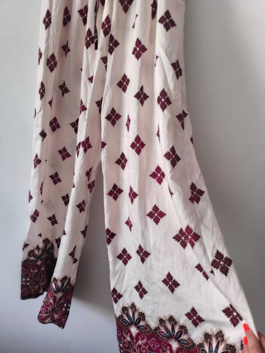 Macacão novo com etiqueta