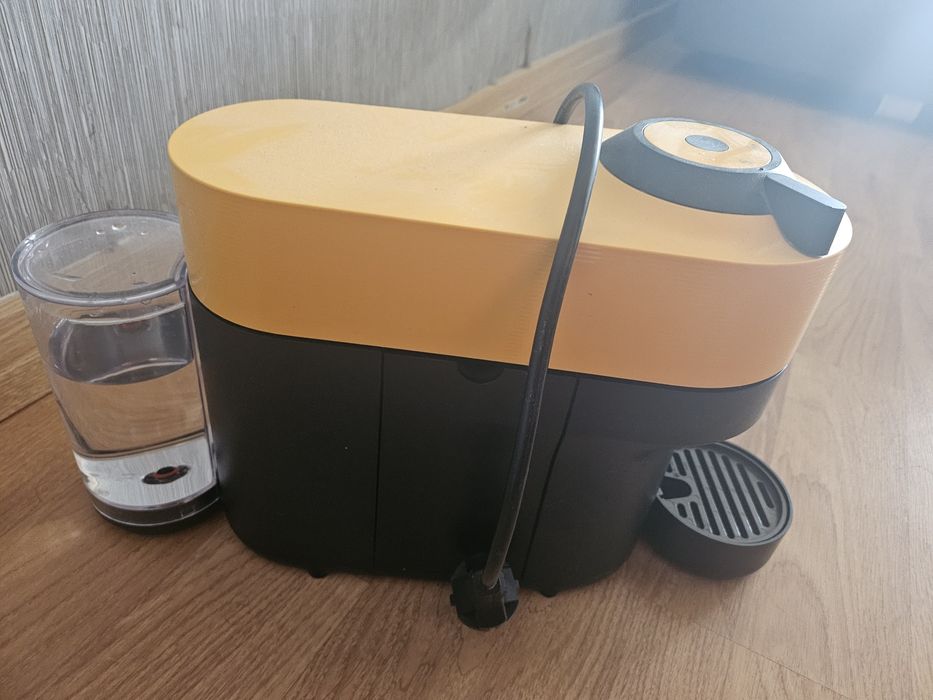 Máquina de café amarela