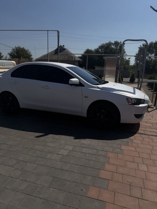 Mitsubishi Lancer 2012 VIN JMBSRCY1ACU005601 фото оголошення 7 з 19