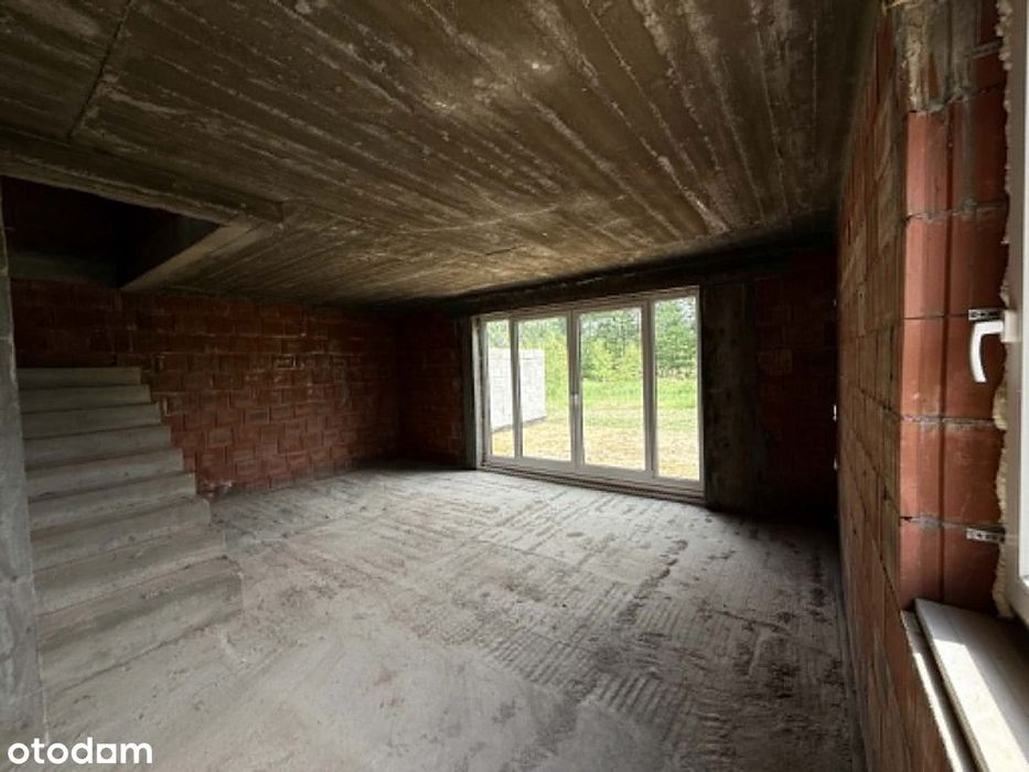 Nowoczesny dom w zabudowie bliźniaczej – 167 m² z garażem i poddaszem.