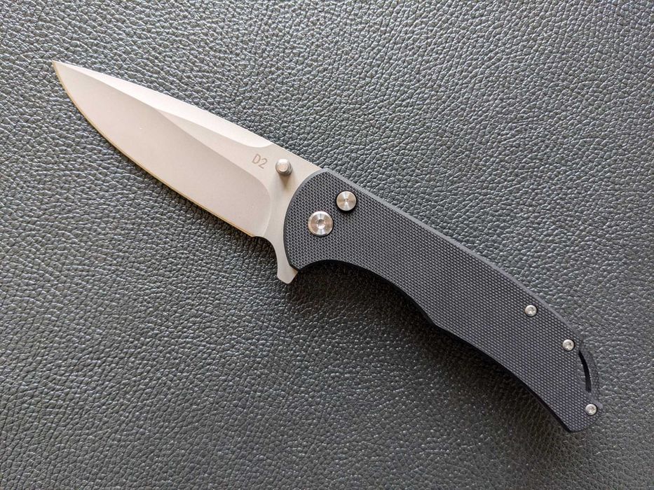 Ніж складний. сталь D2. кнопочний  інерційний ніж
