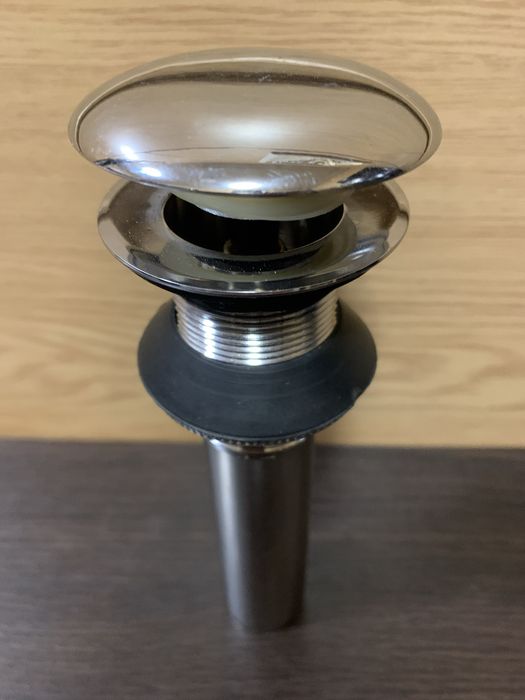 Аксессуары для ванной комнаты: донный клапан и смеситель TUNY