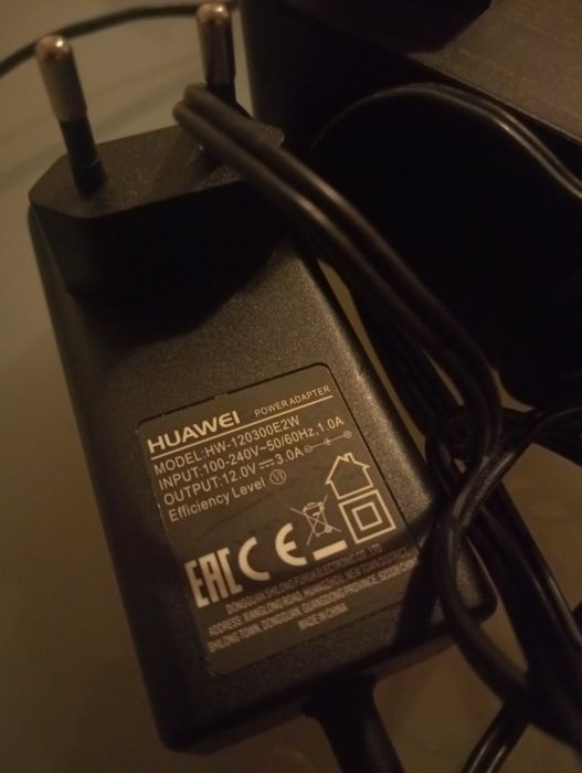 2 transformadores / adptador de corrente AC / DC - Fonte de alimentação: Modelo WA-42D12FG;  Huawei	Modelo HW-120300E2W