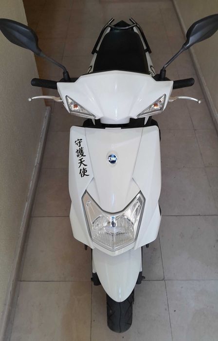 Vendo Scooter SYM 125cc e Roupas.