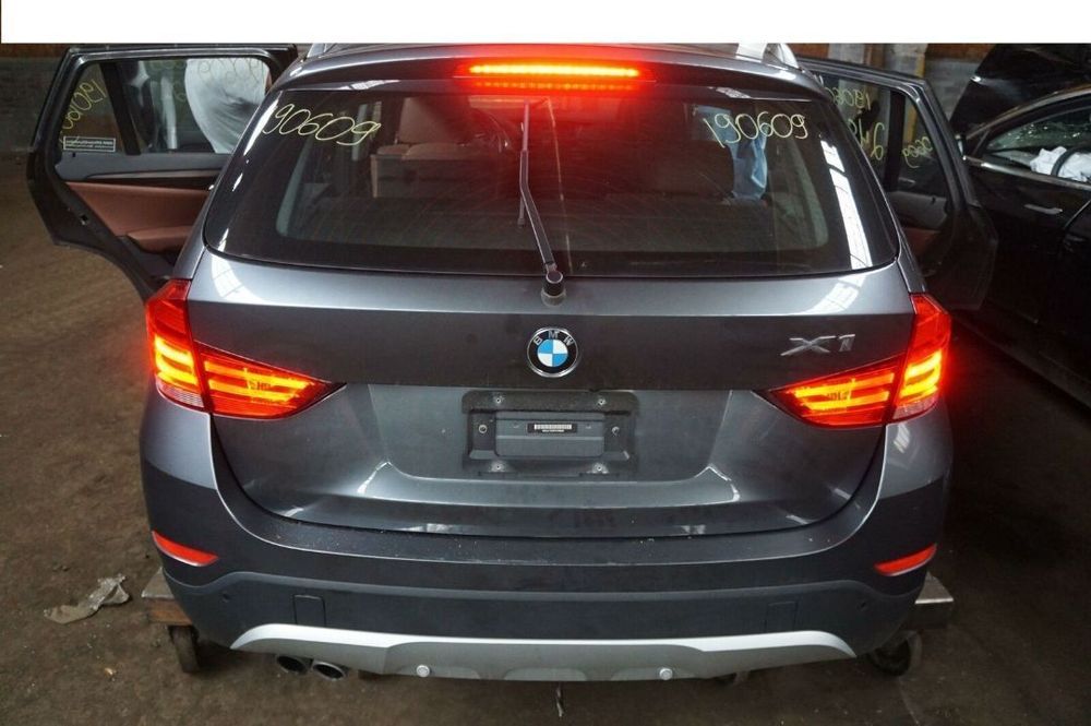 Tampa da mala farolim para choques BMW X1 E84